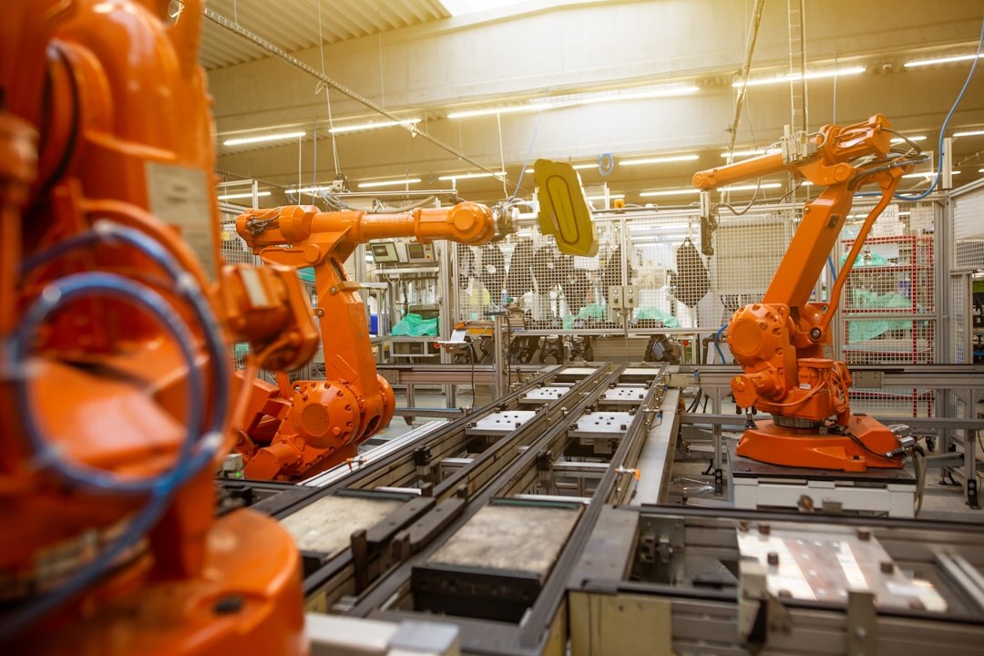 Modern industrial robot arm in factory