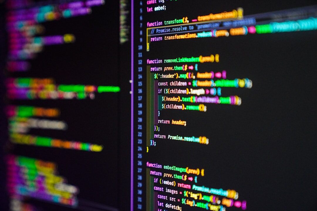 Software code on monitor screen close up