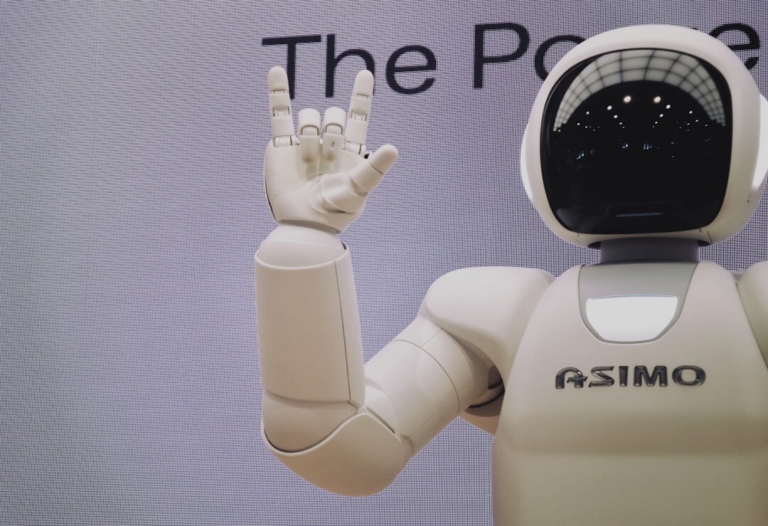 Robot hand and human hand touching fingertips symbolizing human AI collaboration